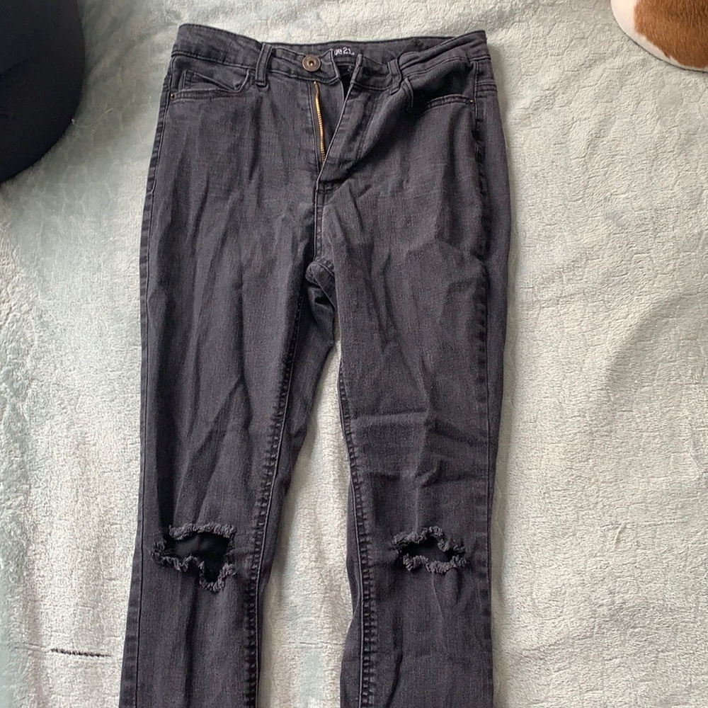Ripped black rue 21 jeans, full length.